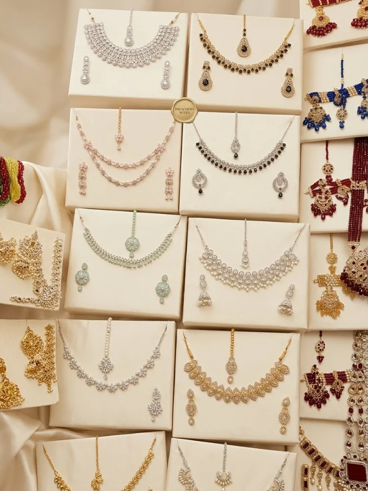 Sparkling Choker and Necklace Sets with Matching Earrings and Maang Tikkas